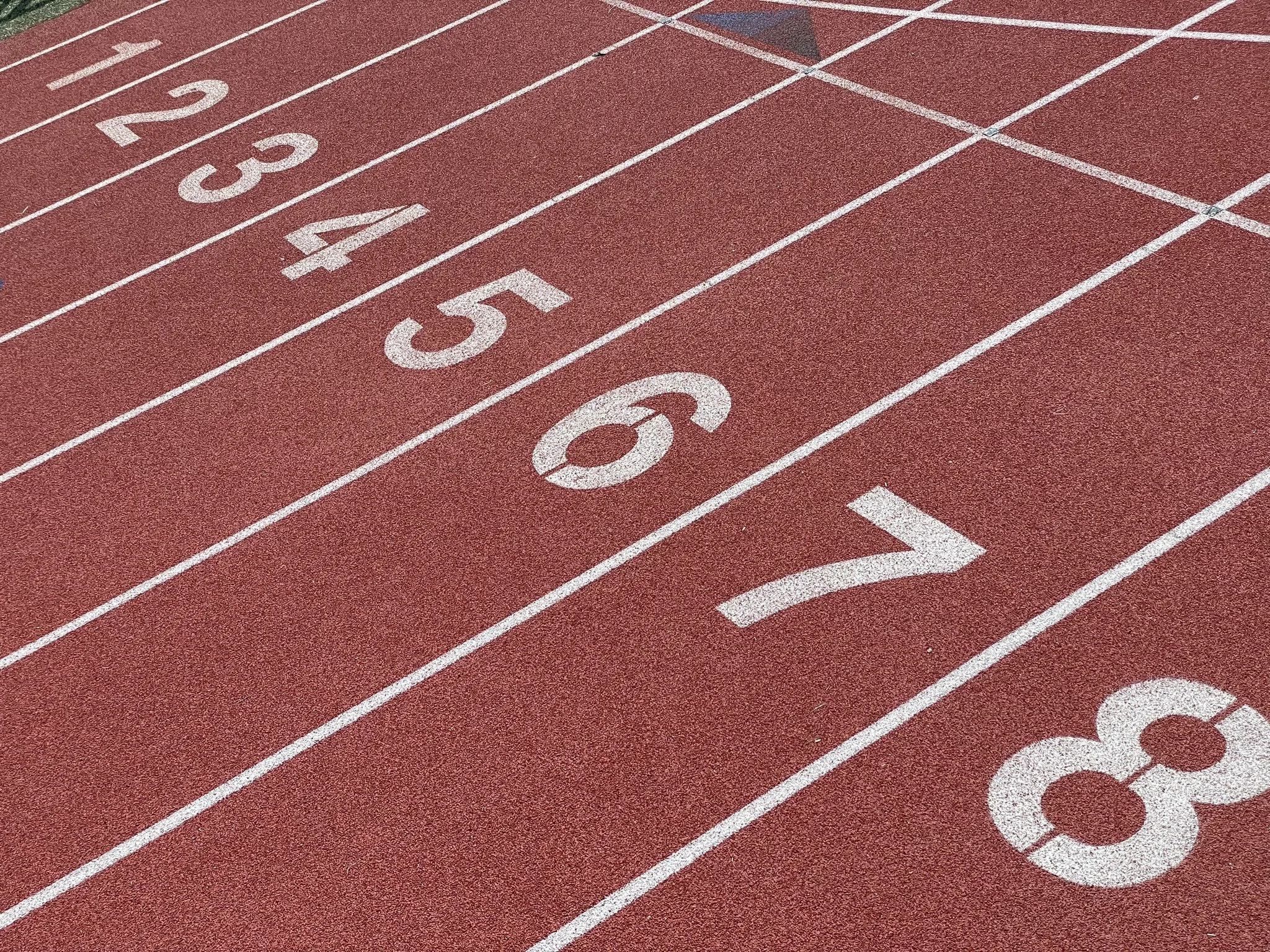 The lane divisions on a running track